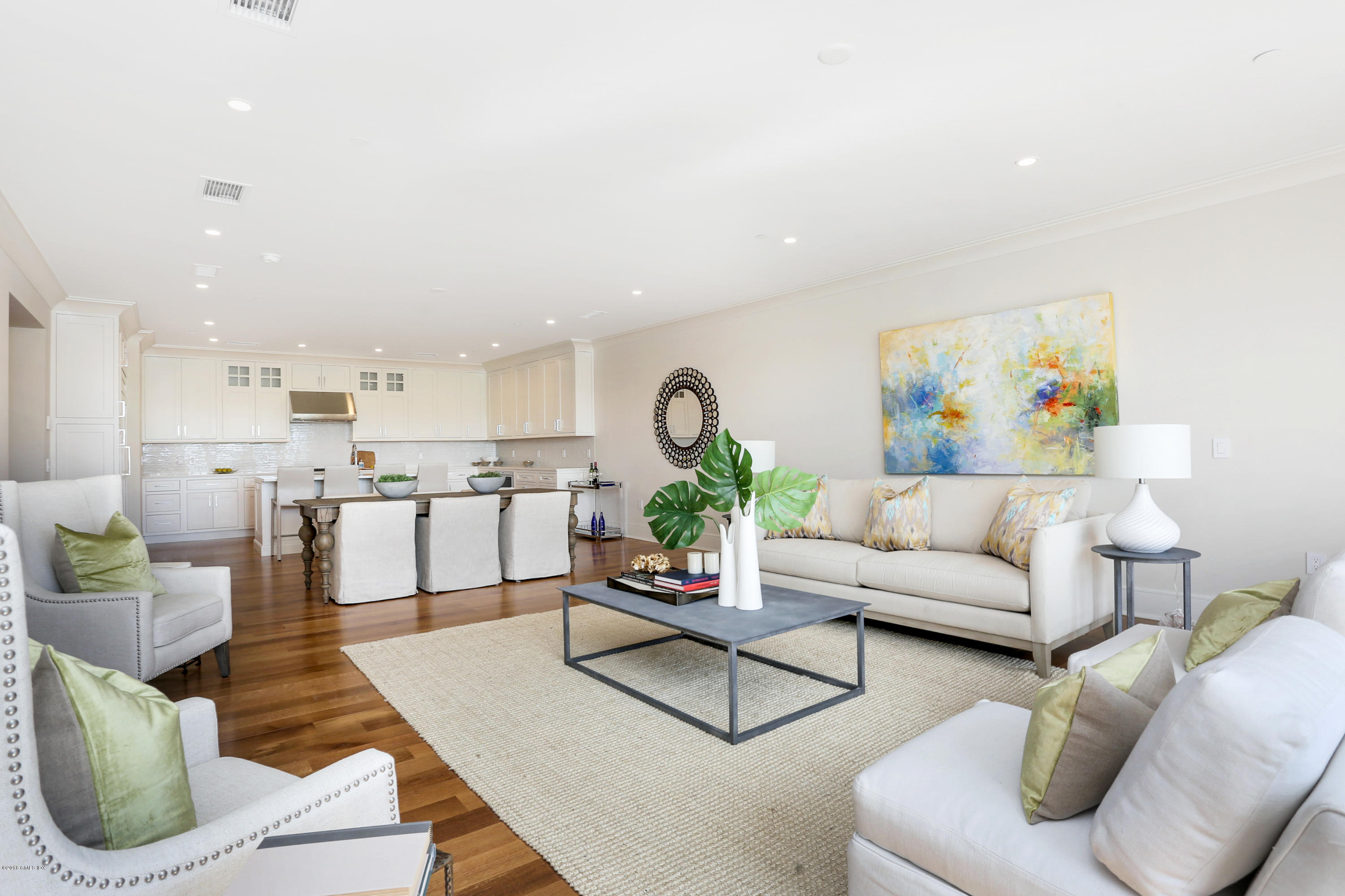 70 Sound View Drive, Unit 2 WEST Greenwich, CT 06830 - Photo 5 of 12 a living room with furniture and a wooden floor
