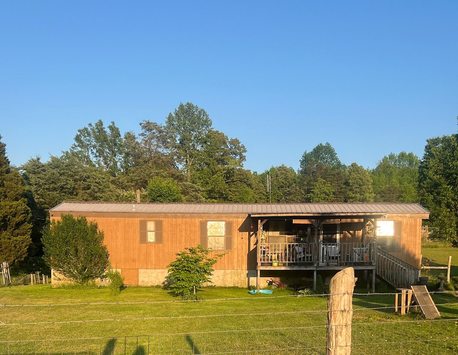 110 Gibson Road Madisonville, TN 37354 - Photo 1 of 32 a front view of a house with a yard