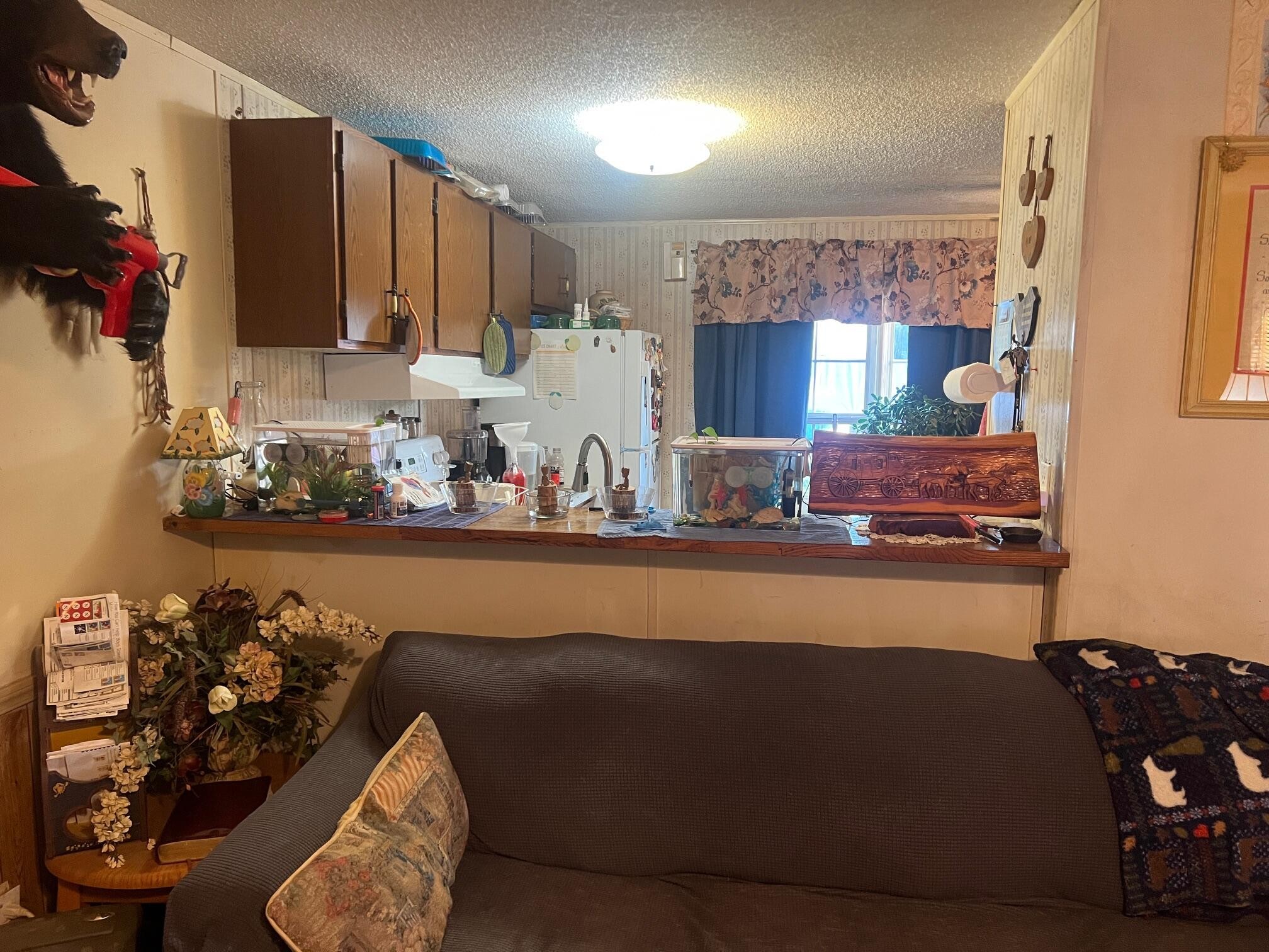 110 Gibson Road Madisonville, TN 37354 - Photo 24 of 32 a room with lots of different furniture and clutter