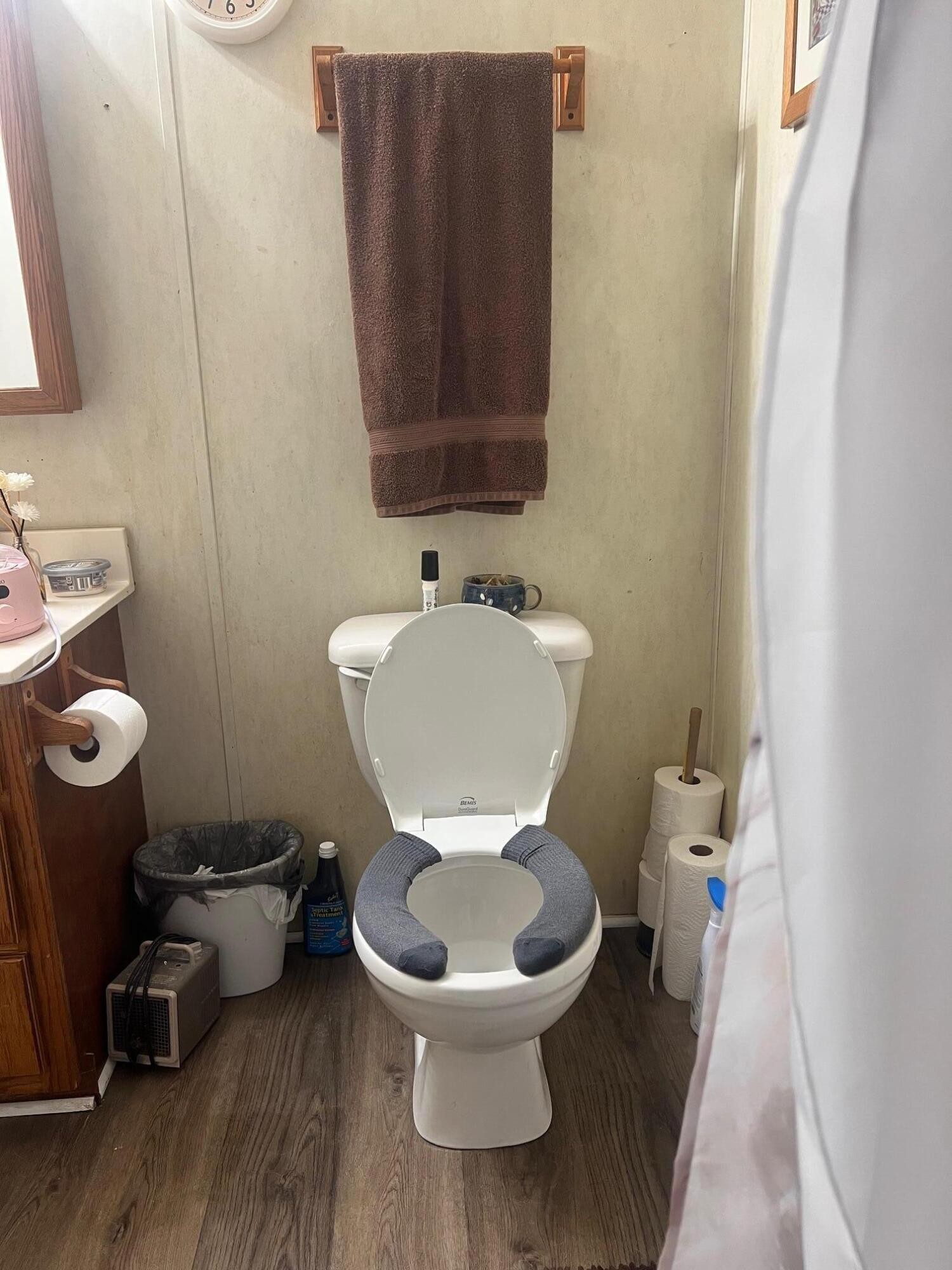 110 Gibson Road Madisonville, TN 37354 - Photo 28 of 32 a white toilet sitting next to a bathroom sink