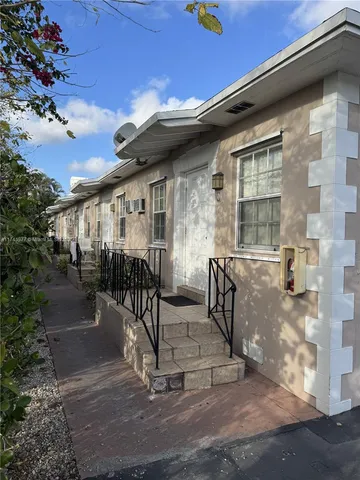 a view of house with outdoor space