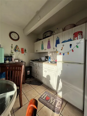 a bathroom with a toilet a sink and shower