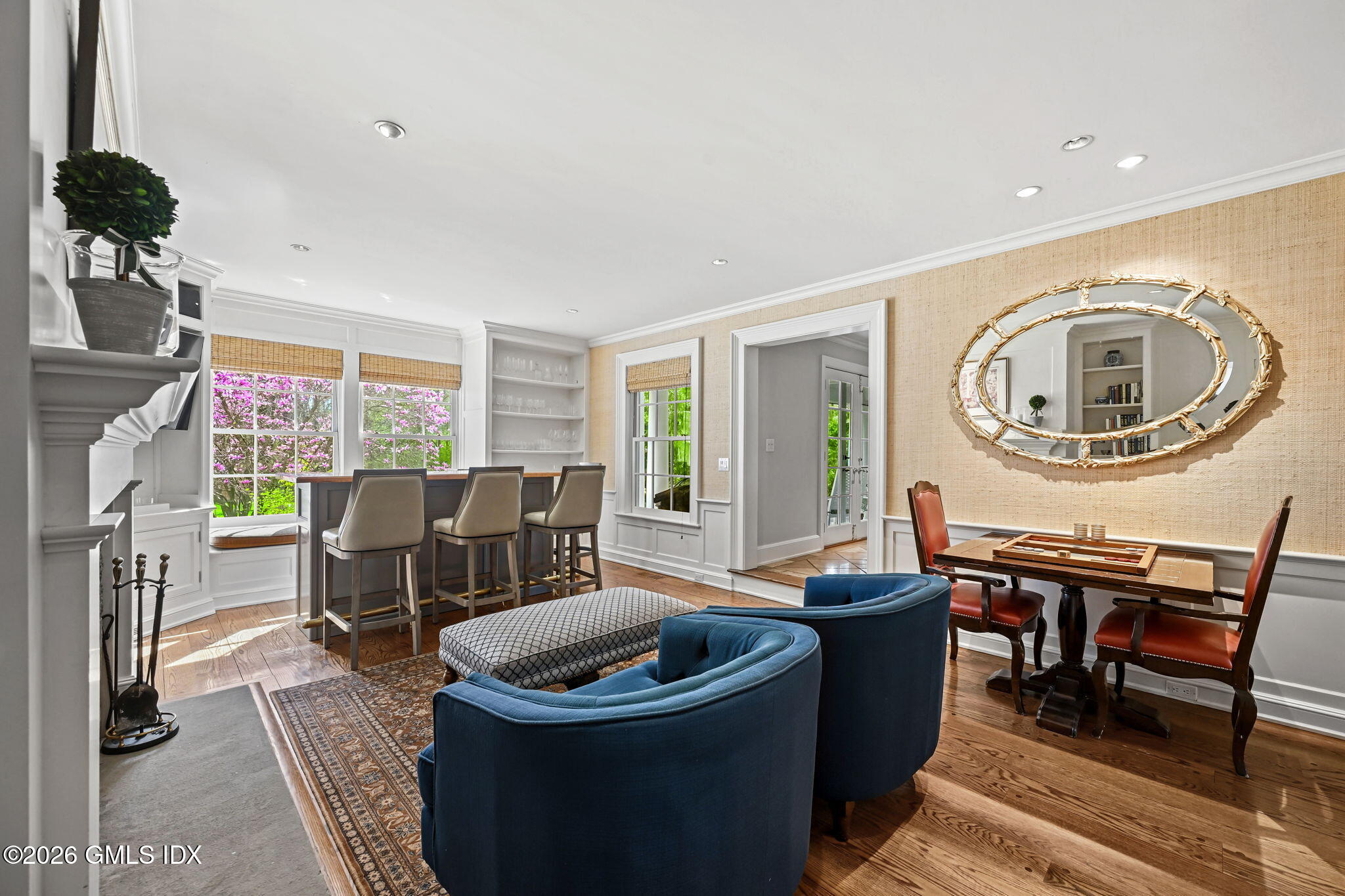 8 Haskell Lane Darien, CT 06820 - Photo 20 of 40 a living room with furniture a window and a clock