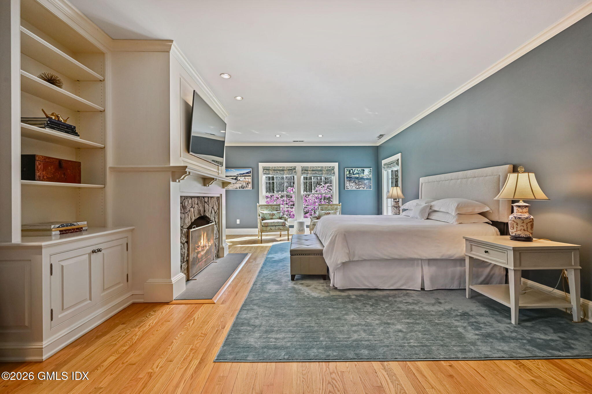 8 Haskell Lane Darien, CT 06820 - Photo 22 of 40 a living room with furniture fireplace and flat screen tv