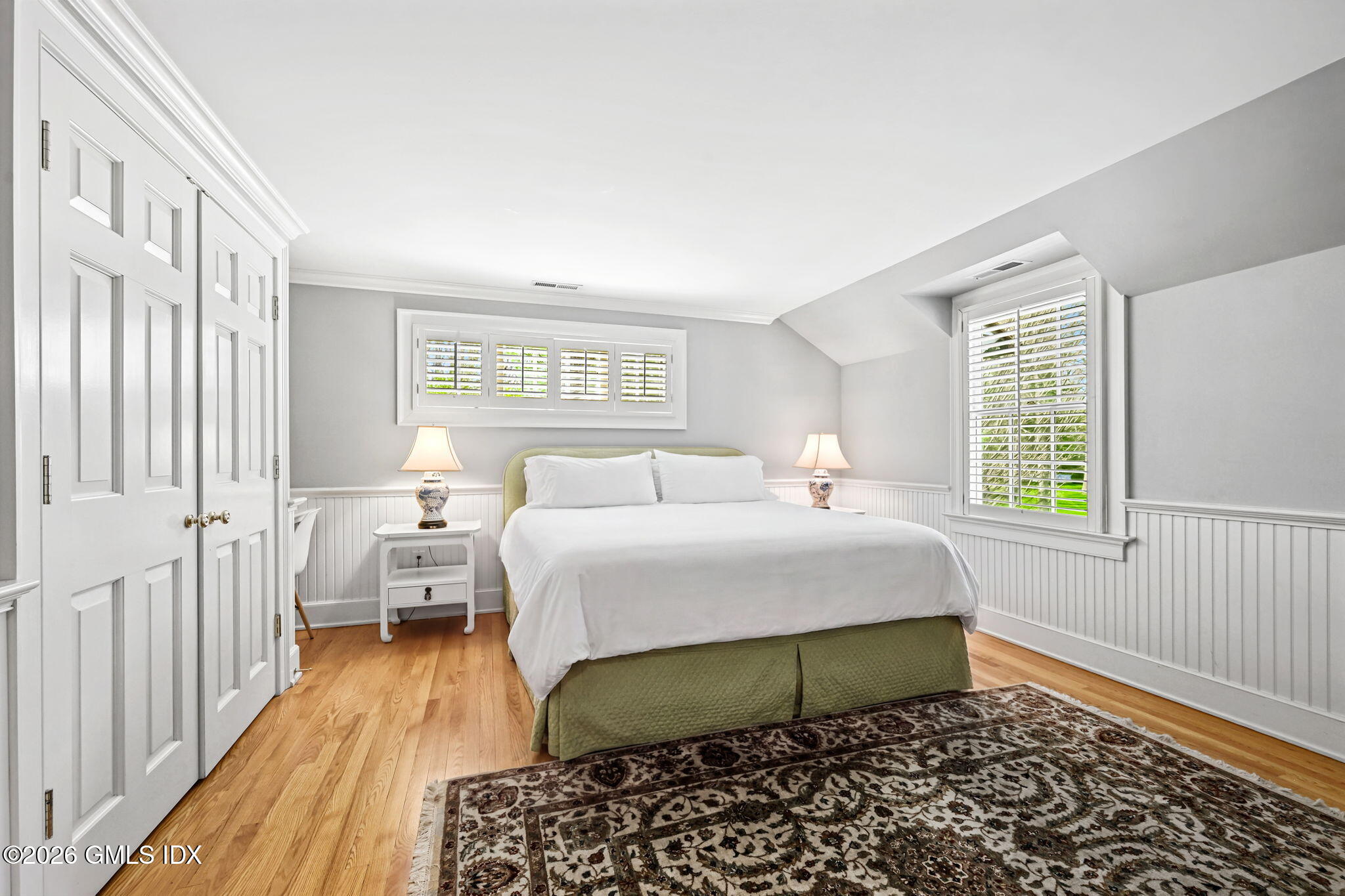 8 Haskell Lane Darien, CT 06820 - Photo 26 of 40 a bedroom with a bed and a window