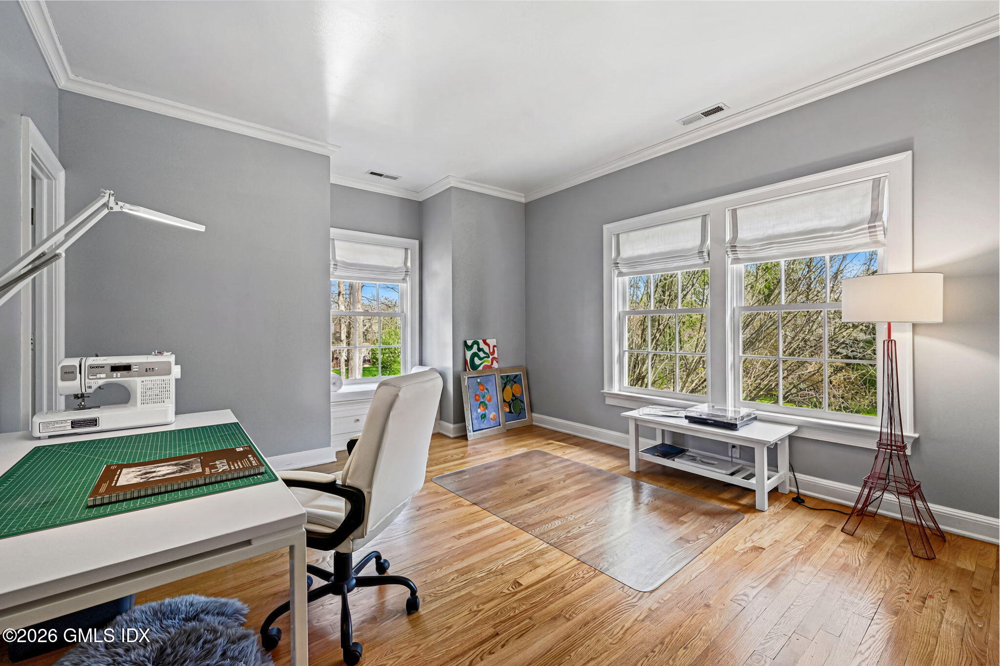 8 Haskell Lane Darien, CT 06820 - Photo 32 of 40 a view of a workspace with furniture and a window
