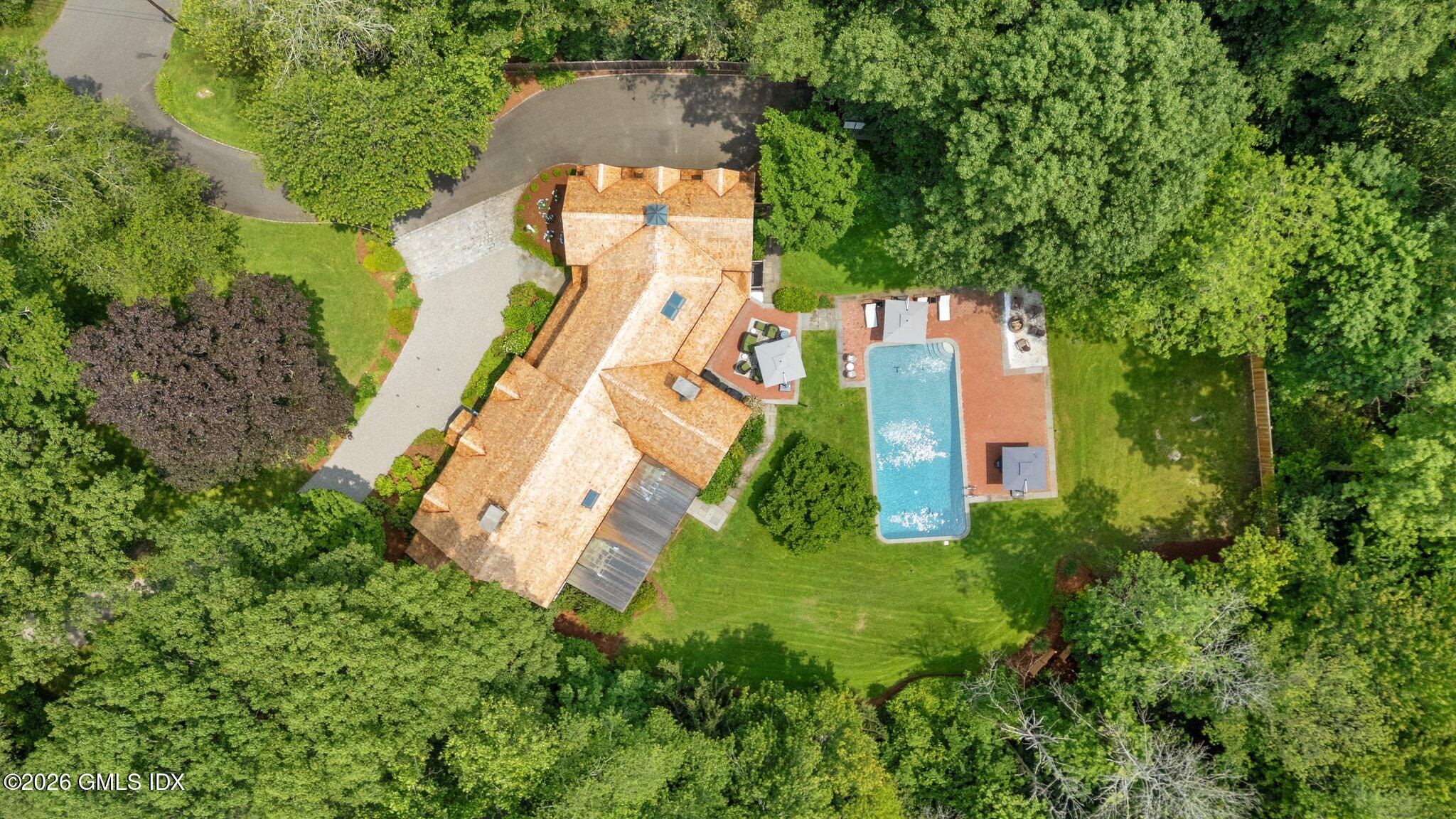 8 Haskell Lane Darien, CT 06820 - Photo 40 of 40 an aerial view of a house with a yard and large trees