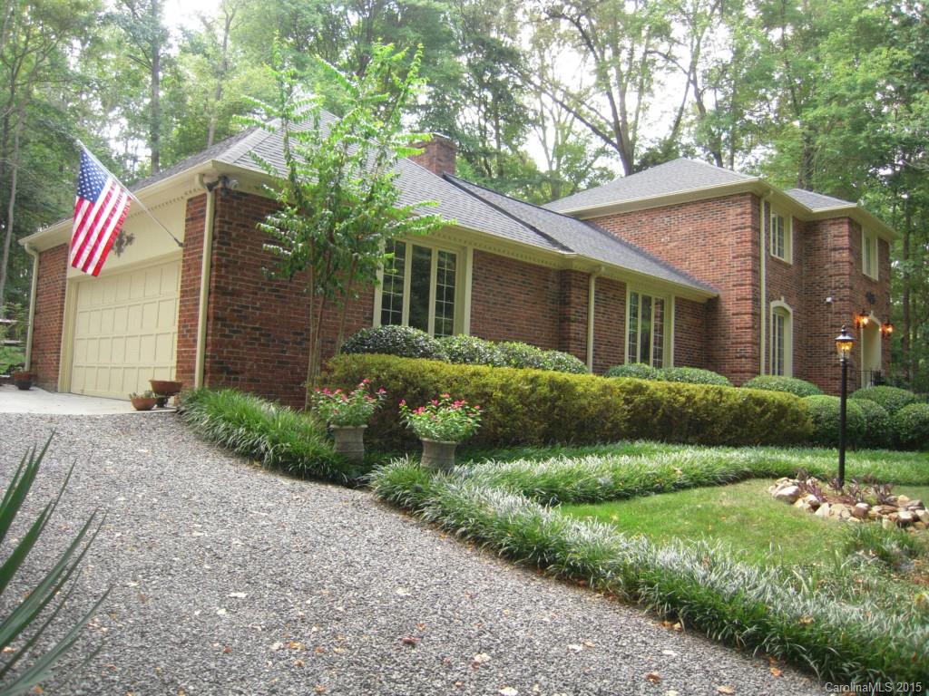3226 Gray Moss Road Charlotte, NC 28270 - Photo 3 of 24 a front view of a house with garden