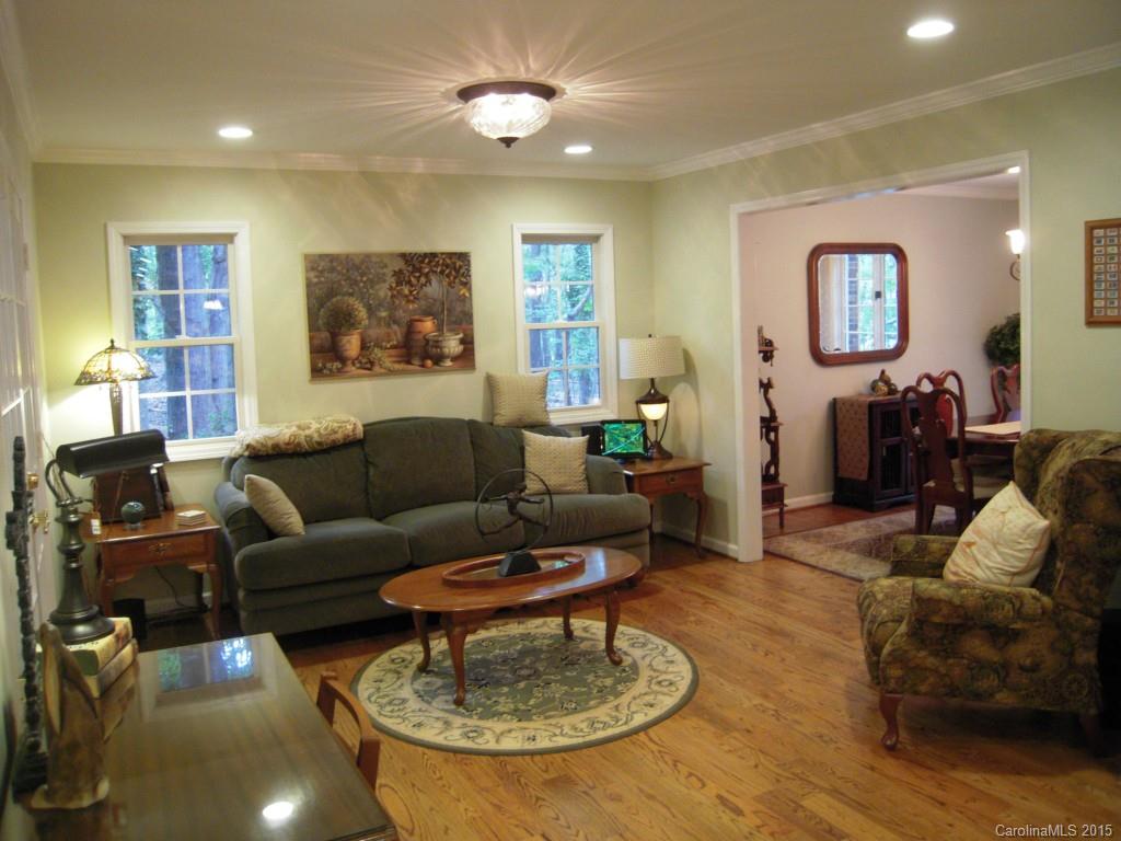 3226 Gray Moss Road Charlotte, NC 28270 - Photo 7 of 24 a living room with furniture and a wooden floor