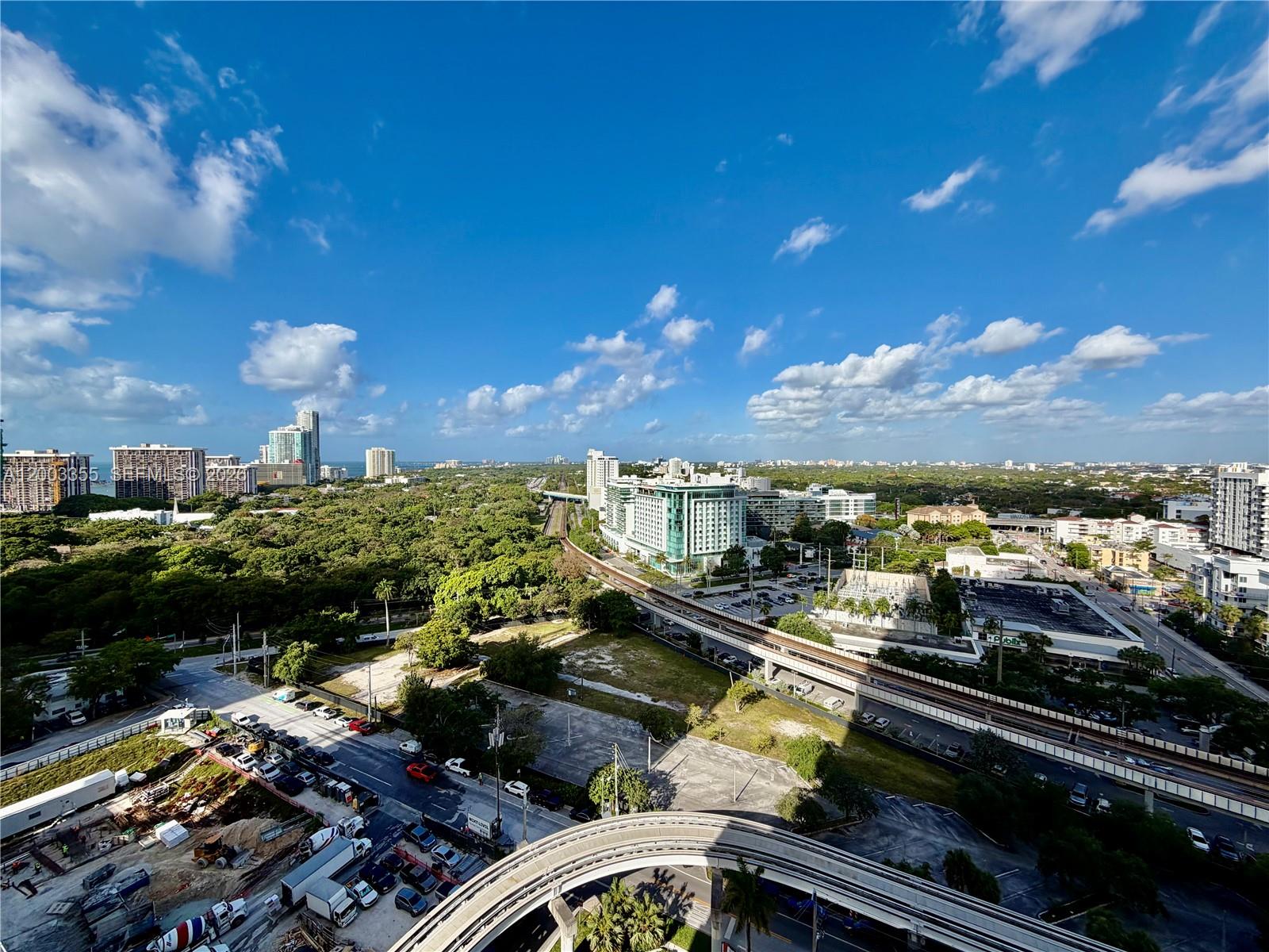 60 Southwest 13th Street, Unit 1605 Miami, FL 33130 - Photo 2 of 18 a view of a balcony with an outdoor space