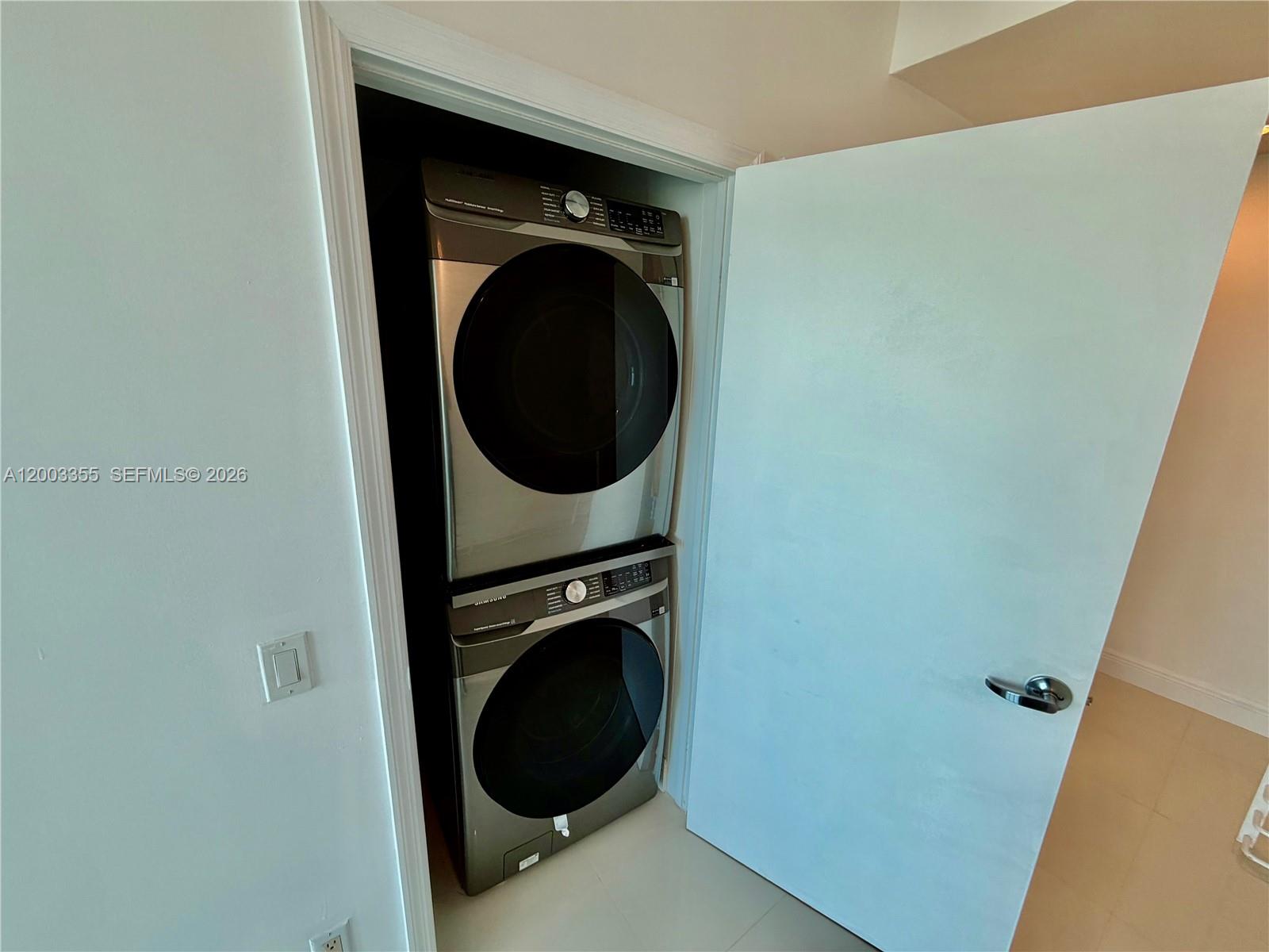 60 Southwest 13th Street, Unit 1605 Miami, FL 33130 - Photo 7 of 18 a close up view of a washer and dryer