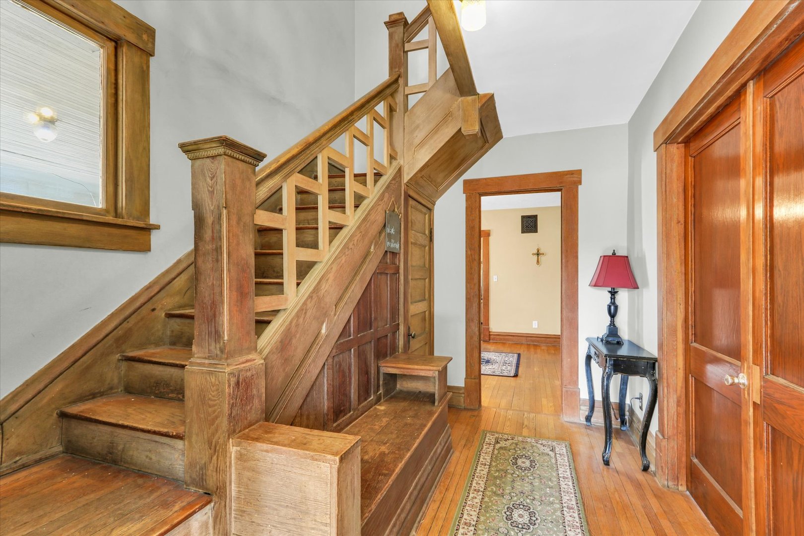 1120 West Church Street Champaign, IL 61821 - Photo 11 of 48 a view of entryway and hall with wooden floor
