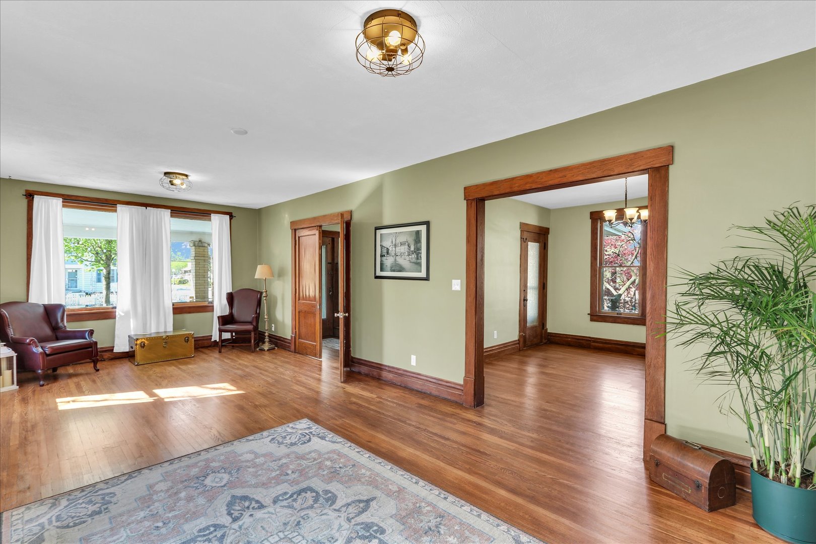 1120 West Church Street Champaign, IL 61821 - Photo 13 of 49 a view of livingroom with hardwood floor and a window