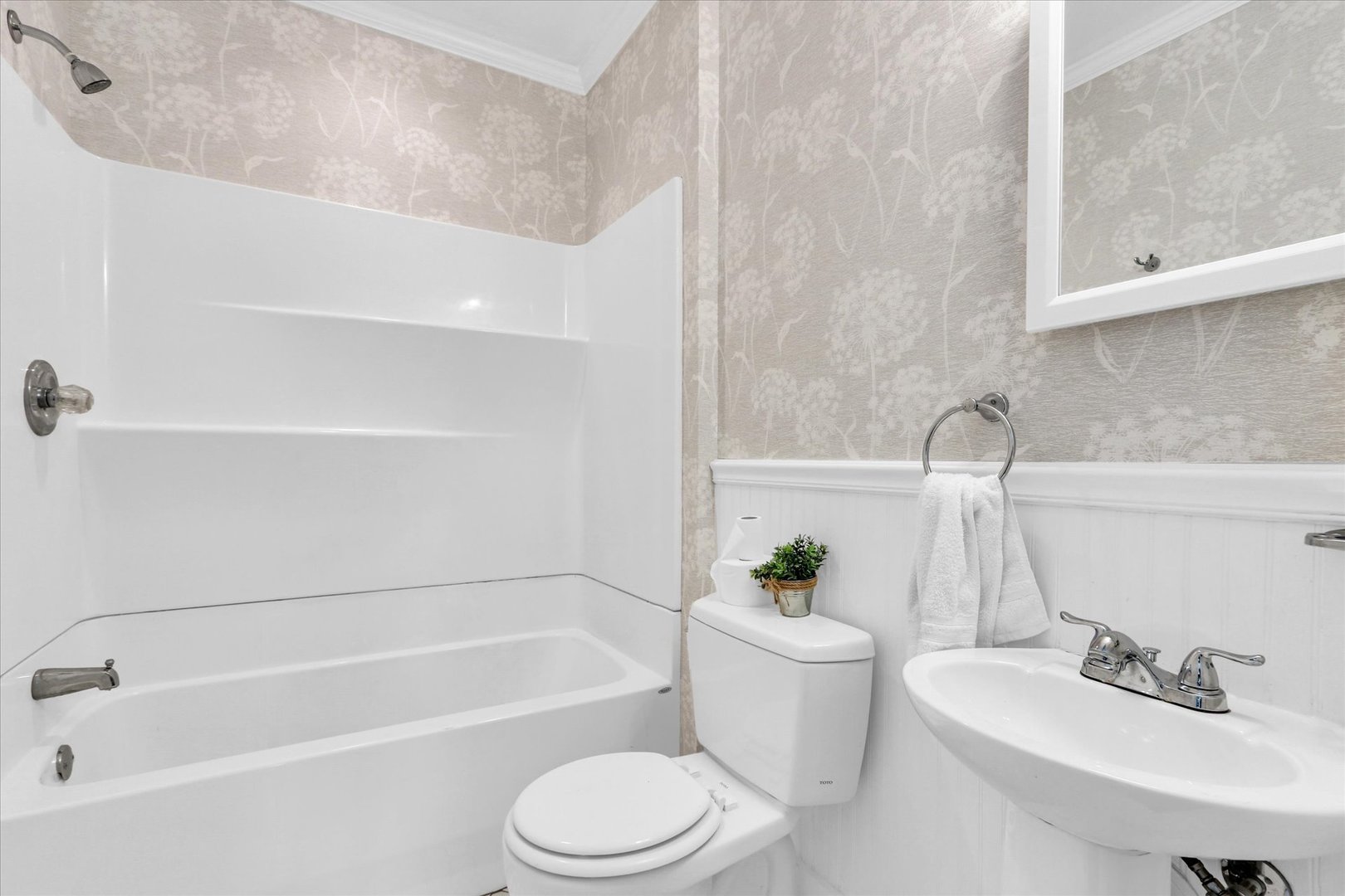 1120 West Church Street Champaign, IL 61821 - Photo 28 of 49 a bathroom with a sink a toilet and bathtub