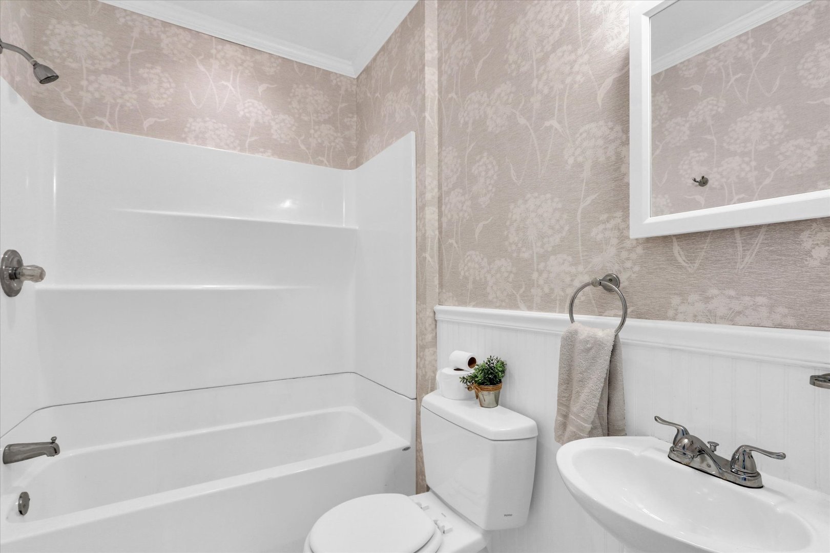 1120 West Church Street Champaign, IL 61821 - Photo 35 of 48 a bathroom with a sink a toilet and bathtub