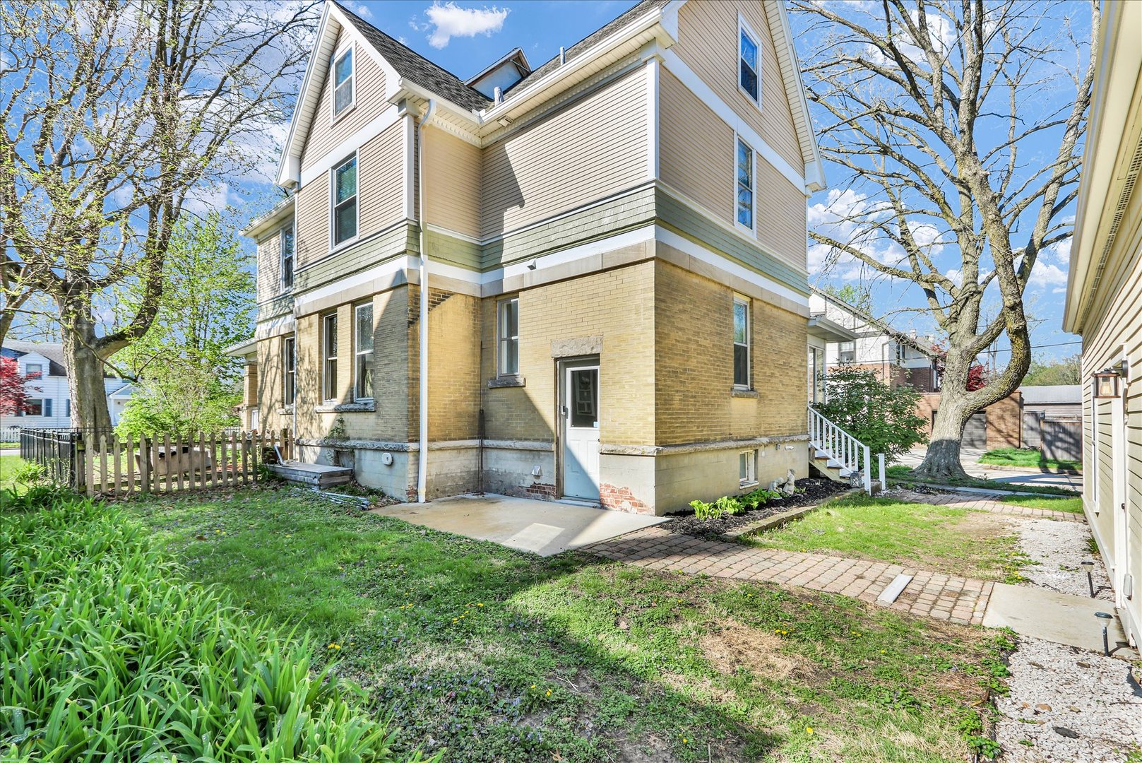1120 West Church Street Champaign, IL 61821 - Photo 41 of 49 a view of a house with a yard