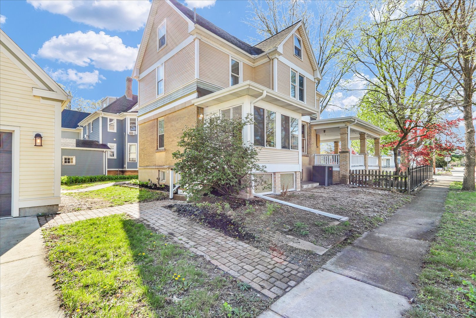 1120 West Church Street Champaign, IL 61821 - Photo 42 of 49 a view of a building with a garden