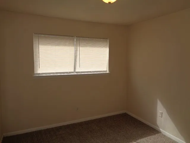 an empty room with a window