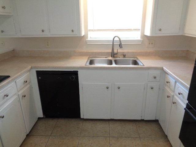 29419 Raestone Street Spring, TX 77386 - Photo 3 of 19 a kitchen with a sink and cabinets