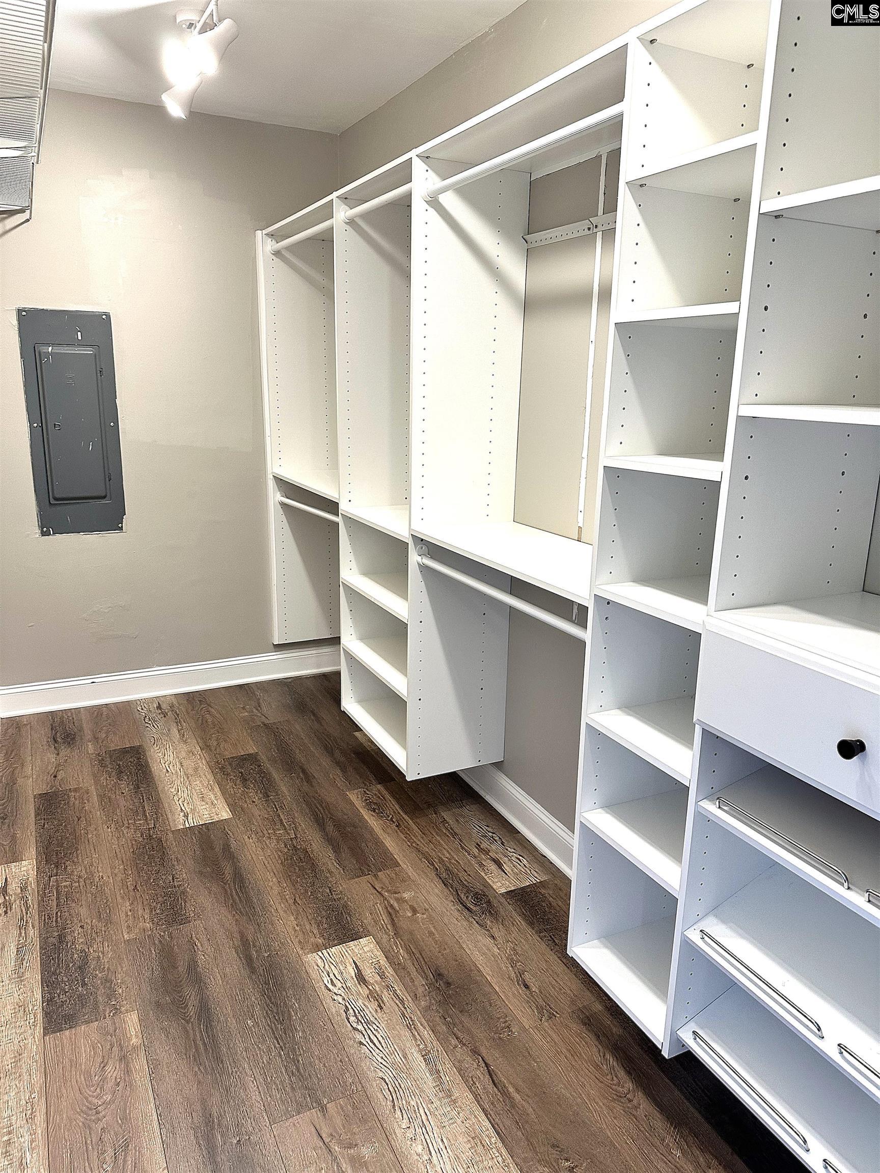 535 Sandbar Road Chapin, SC 29036 - Photo 19 of 23 a view of walk in closet with empty racks