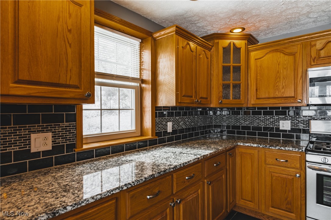 111 River Hill Road Washington, WV 26181 - Photo 6 of 29 Check out the large countertop space for your working area. Window looks to the side of the home.
