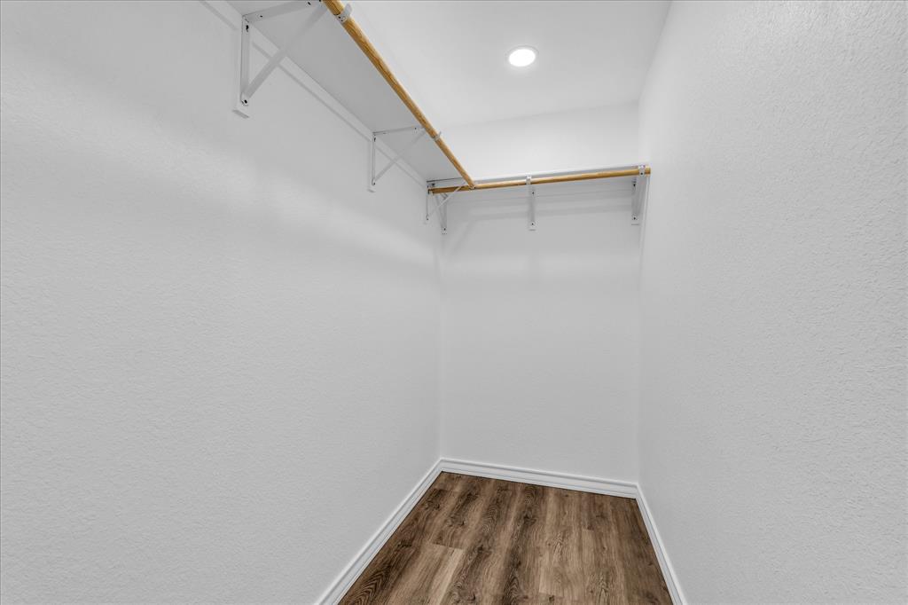 204 North Wiebusch Street Riesel, TX 76682 - Photo 19 of 33 a view of a room with racks on the wall