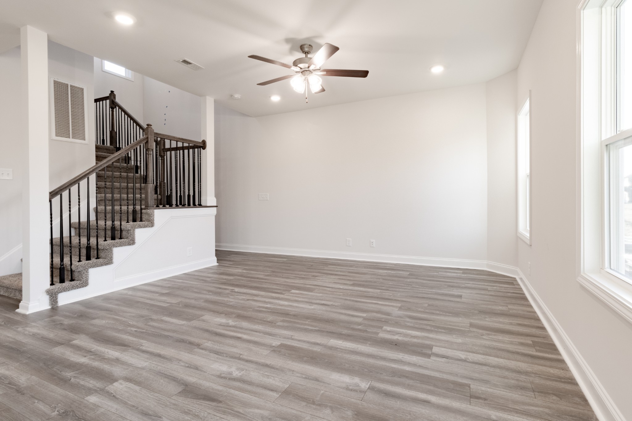 217 Clark Road Clarksville, TN 37042 - Photo 11 of 36 wooden floor in an empty room with a window