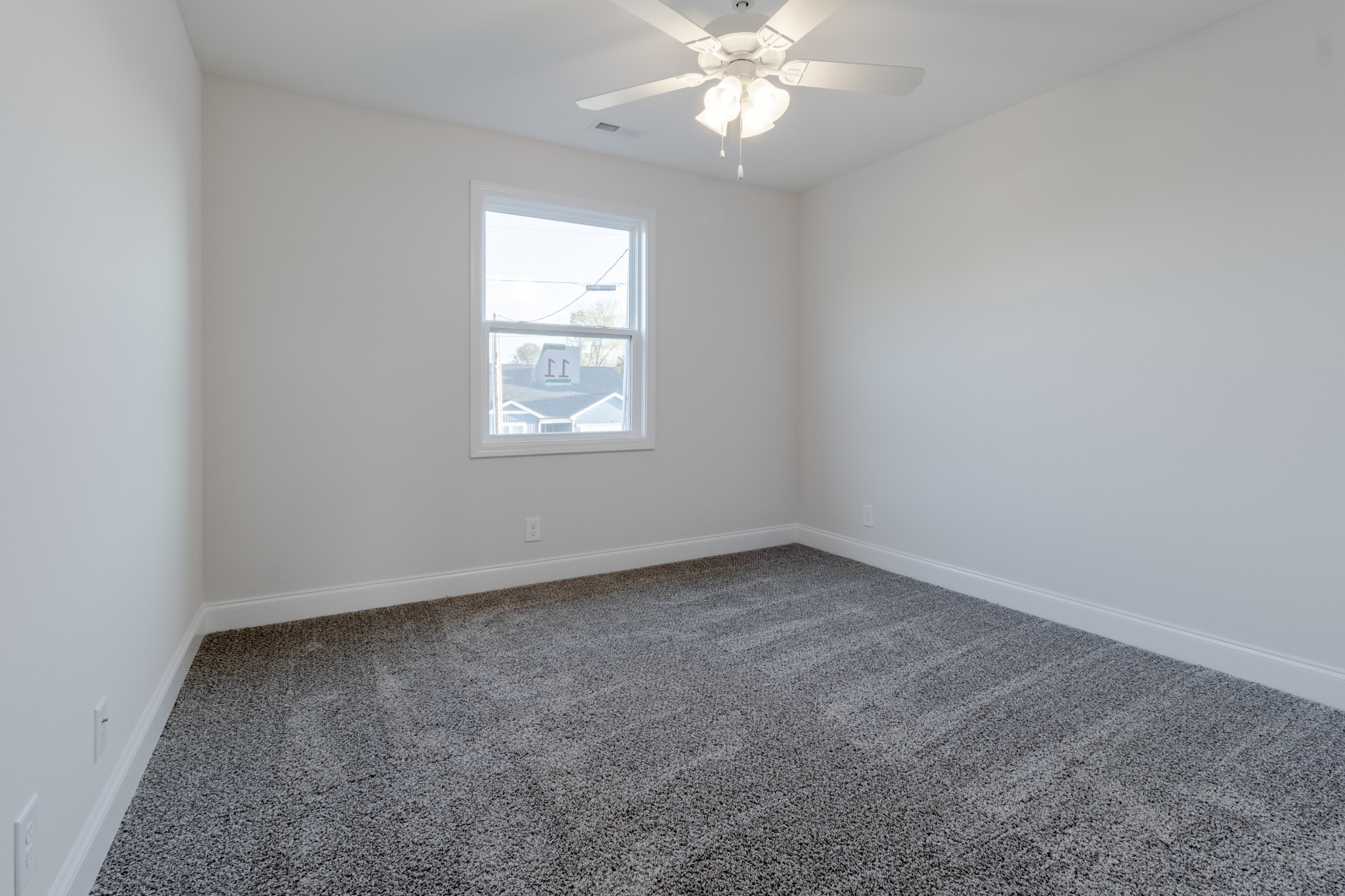 217 Clark Road Clarksville, TN 37042 - Photo 25 of 36 an empty room with a window