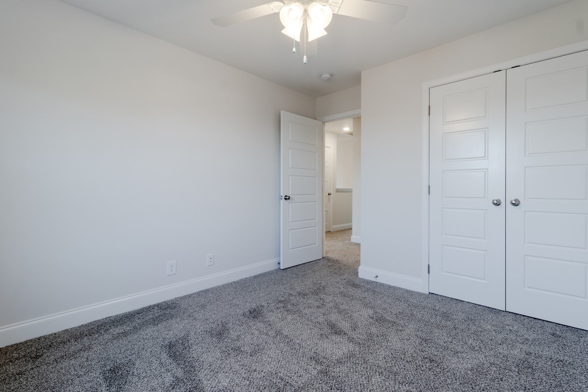 217 Clark Road Clarksville, TN 37042 - Photo 28 of 36 an empty room with a ceiling fan and entryway