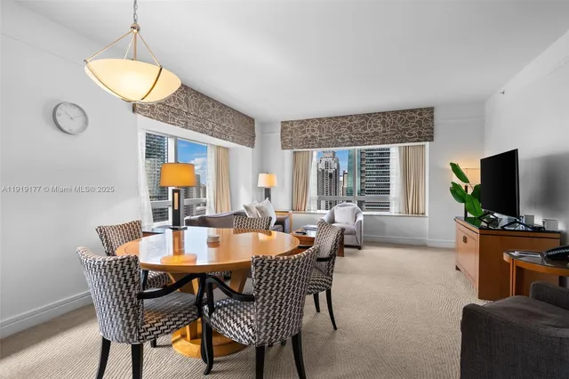 a view of a dining room with furniture