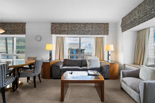a kitchen with granite countertop a sink and cabinets