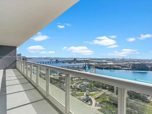 a view of a city skyline from a balcony