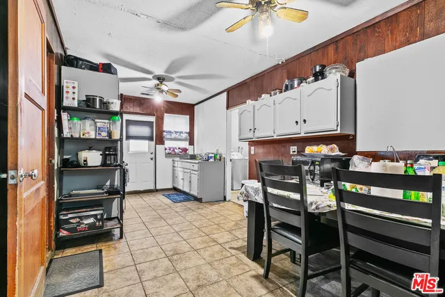 a view of work room with furniture
