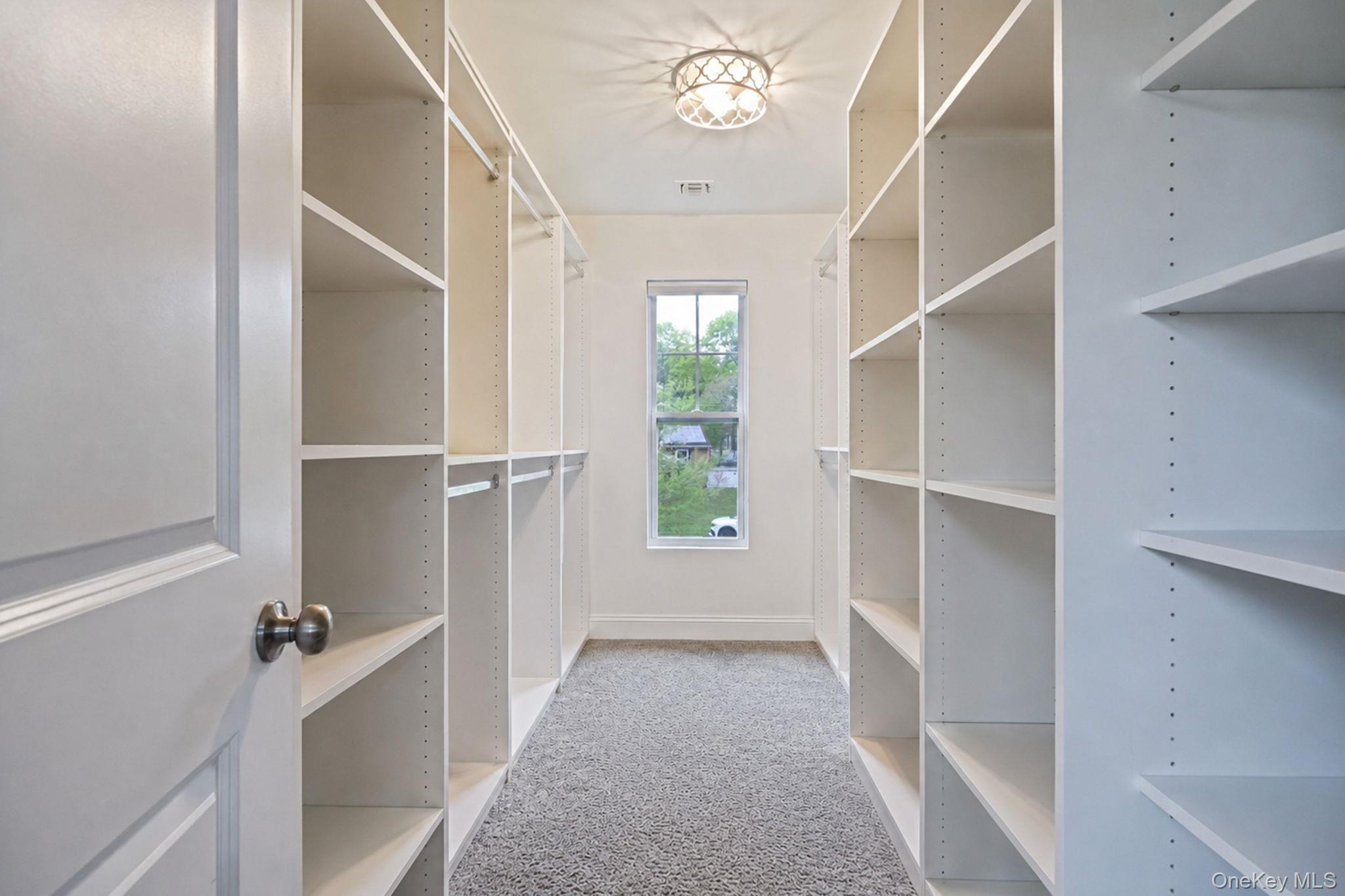 86 Country Road Medford, NY 11763 - Photo 31 of 47 Primary En-Suite Walk In Closet, Custom Built Ins