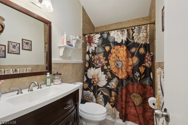 a room with furniture a rug and a window