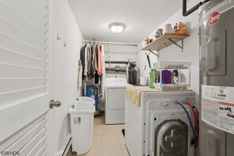 23 Fordham Trail Hopatcong, NJ 07843 - Photo 23 of 31 a view of a storage & utility room with washer and dryer