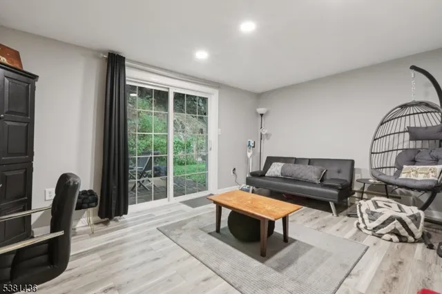 a room with gym equipment and a window