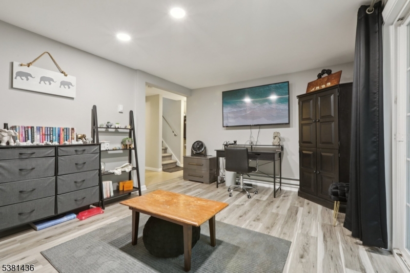 23 Fordham Trail Hopatcong, NJ 07843 - Photo 25 of 31 a room with gym equipment and a window