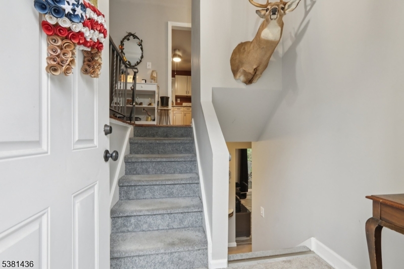 23 Fordham Trail Hopatcong, NJ 07843 - Photo 4 of 31 a view of entryway and hall with wooden floor