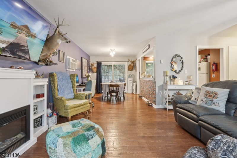 23 Fordham Trail Hopatcong, NJ 07843 - Photo 8 of 31 a living room with furniture and a fireplace