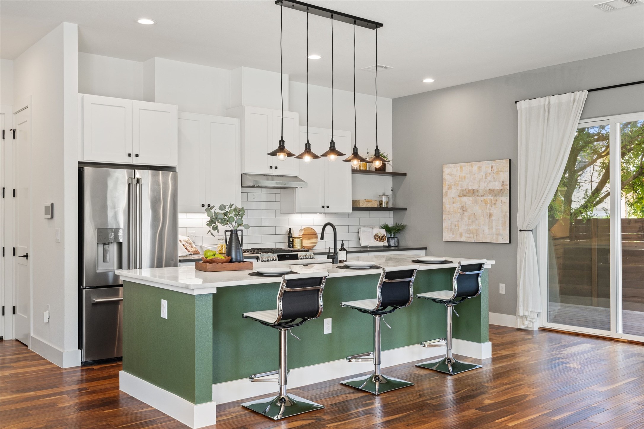 5601 Jackie Robinson Street, Unit 1 Austin, TX 78721 - Photo 11 of 40 An inviting kitchen made for the homeowner that loves to entertain.