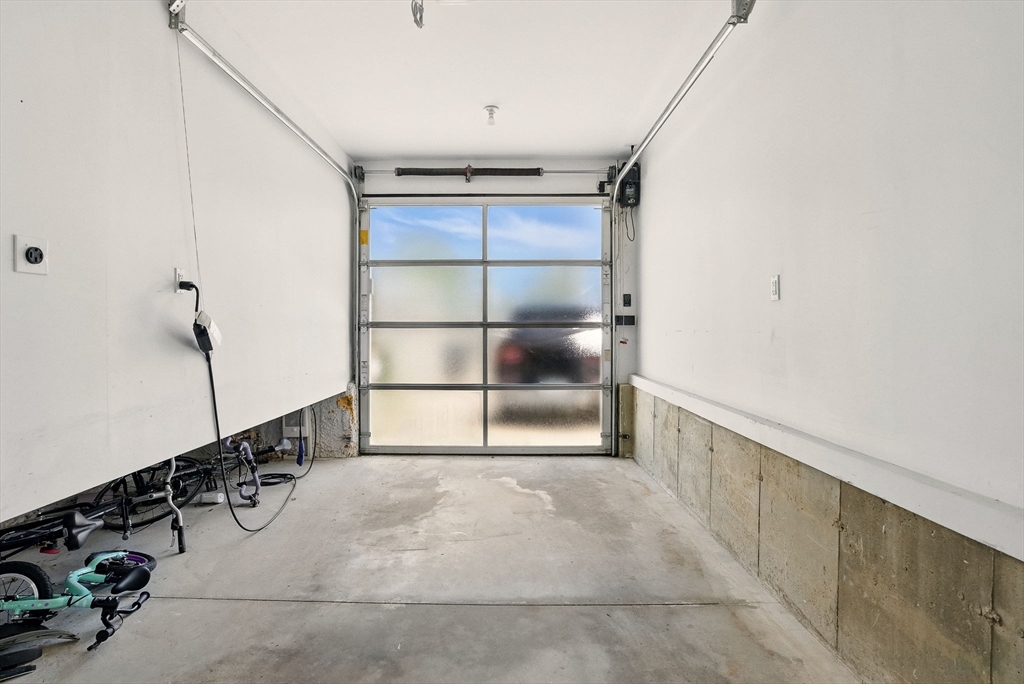 151 Sherman Street Cambridge, MA 02140 - Photo 22 of 35 a view of a room with racks on the wall