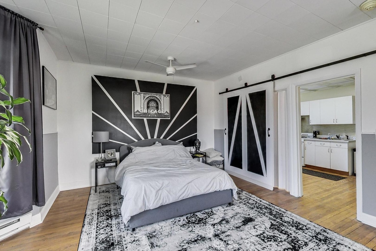 25 Webster Avenue Highwood, IL 60040 - Photo 14 of 25 a bed room with a bed and a walk in closet