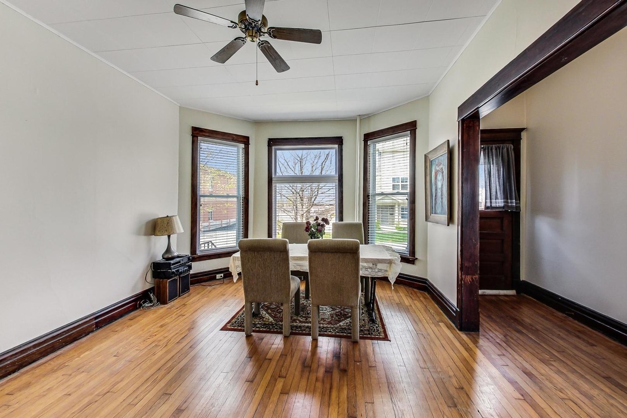 25 Webster Avenue Highwood, IL 60040 - Photo 2 of 25 a view of a dining room with furniture window and wooden floor
