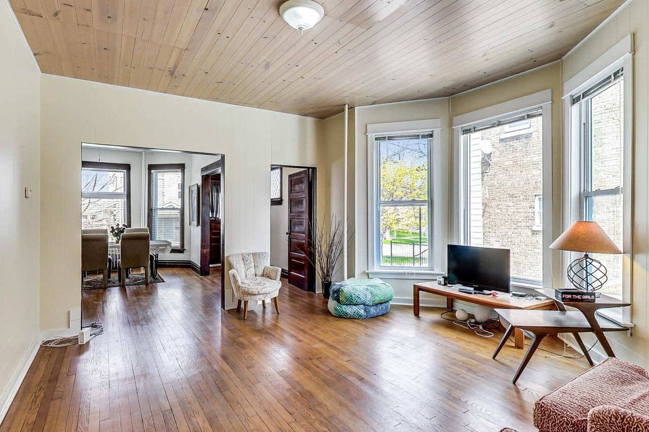 25 Webster Avenue Highwood, IL 60040 - Photo 3 of 25 a living room with furniture and a flat screen tv