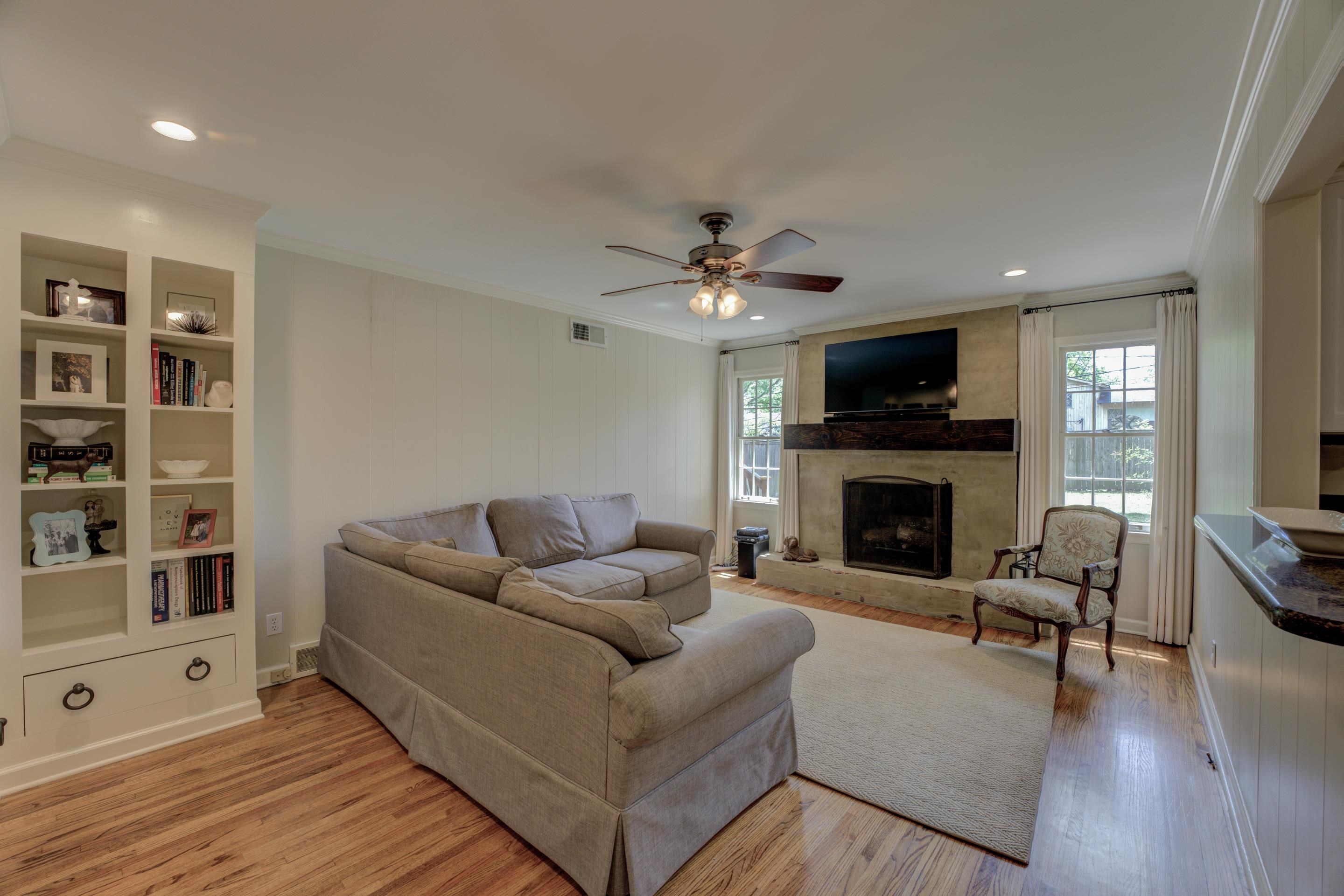 5507 Barfield Road Memphis, TN 38120 - Photo 4 of 31 a living room with furniture and a fireplace