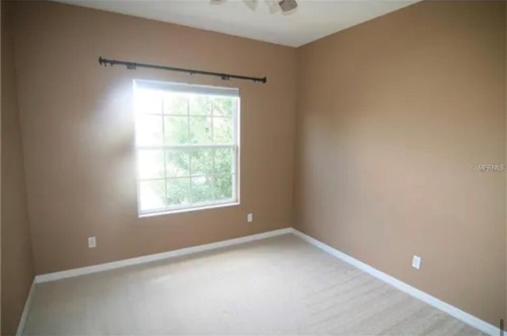 1518 Tally Circle Oviedo, FL 32765 - Photo 12 of 15 an empty room with a window