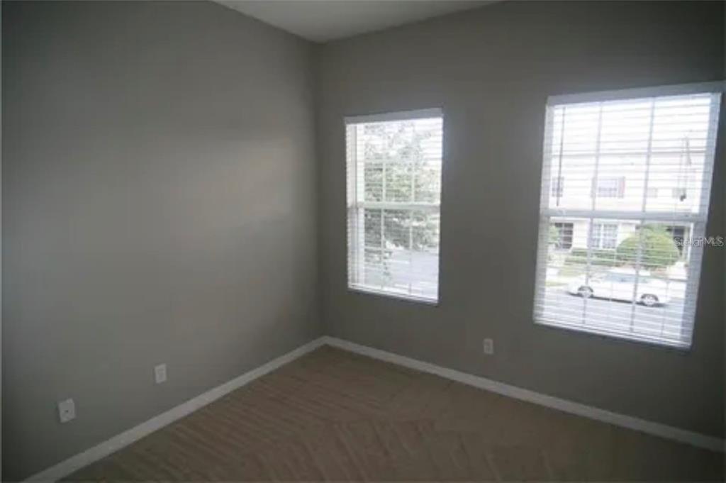 1518 Tally Circle Oviedo, FL 32765 - Photo 14 of 15 an empty room with a window