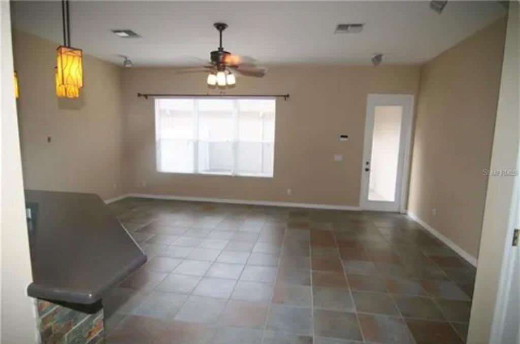 1518 Tally Circle Oviedo, FL 32765 - Photo 2 of 15 a view of an empty room with a window