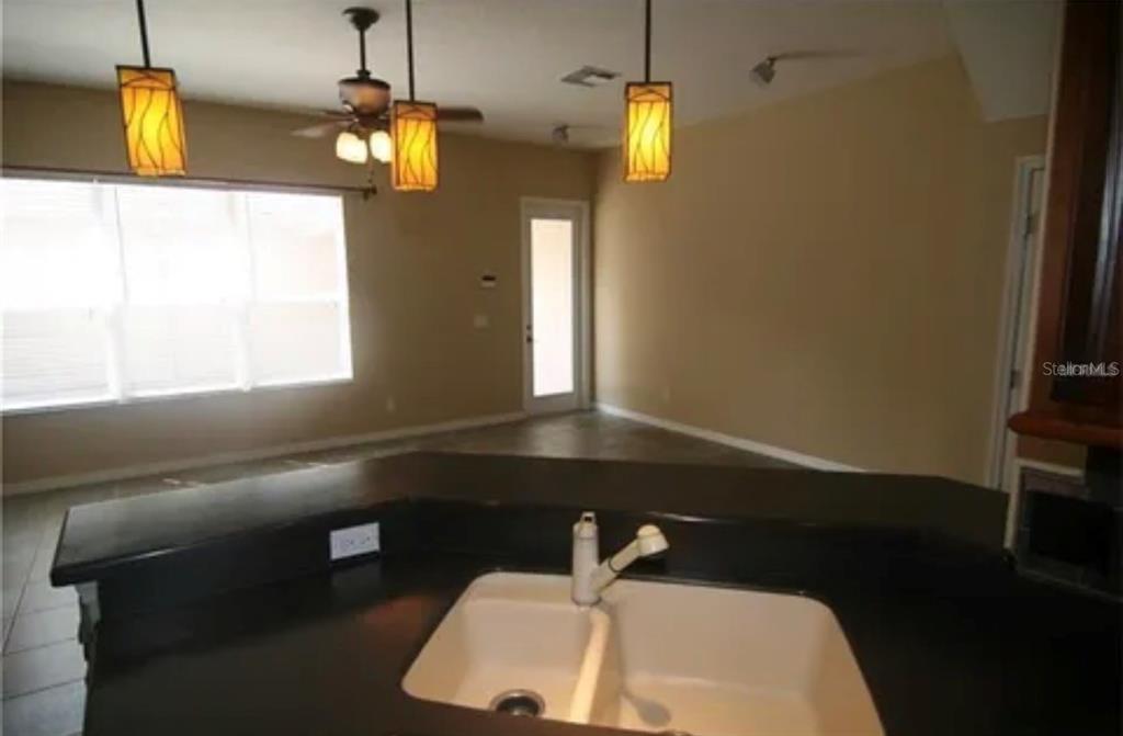 1518 Tally Circle Oviedo, FL 32765 - Photo 6 of 15 a bathroom with a sink and a window